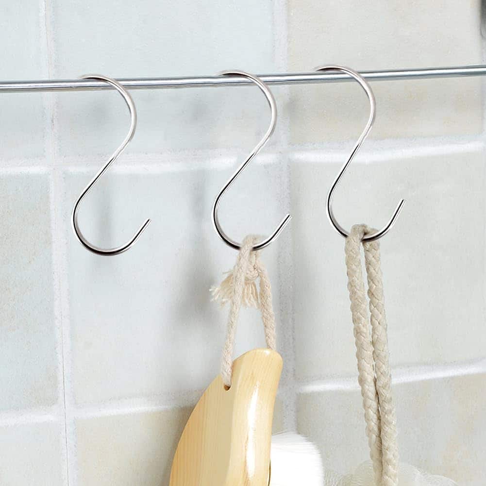 S hooks hanging kitchen utensils on a rail (Zigoal)