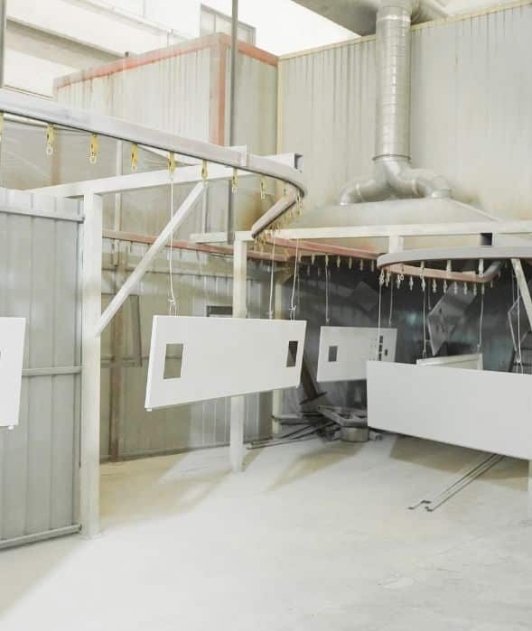 Parts hanging on a spray coating line for spring surface finishing (Zigoal)