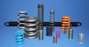 Springs with different coatings and surface finishes