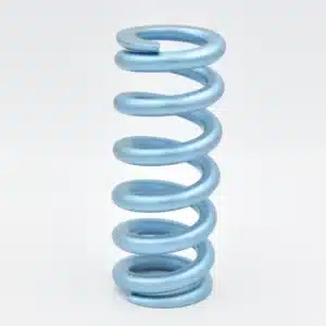 Titanium compression spring with blue finish