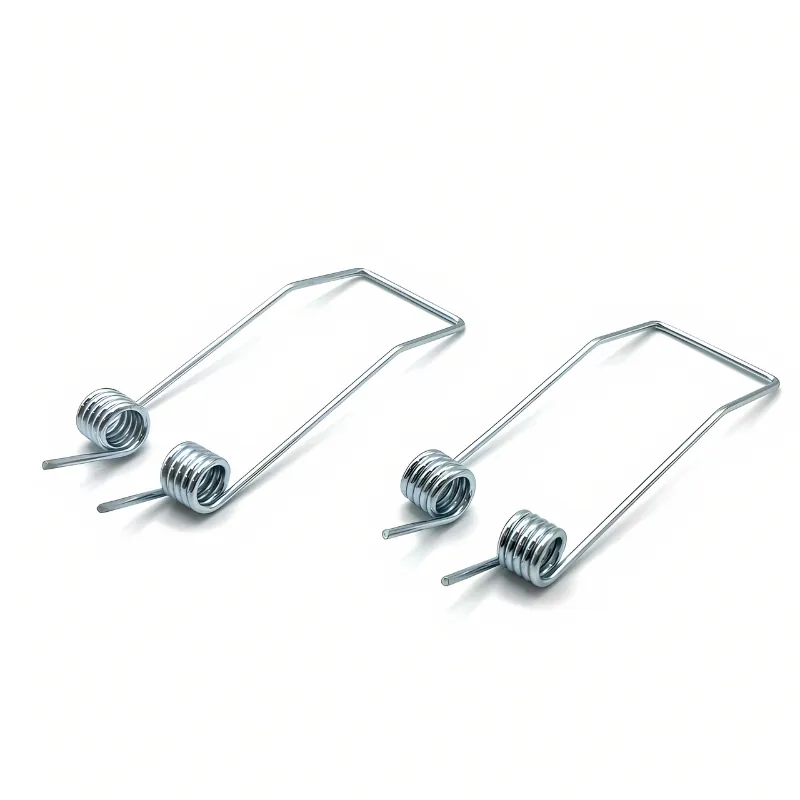Double torsion spring prototypes with two coil bodies joined by a centre bridge (Zigoal)